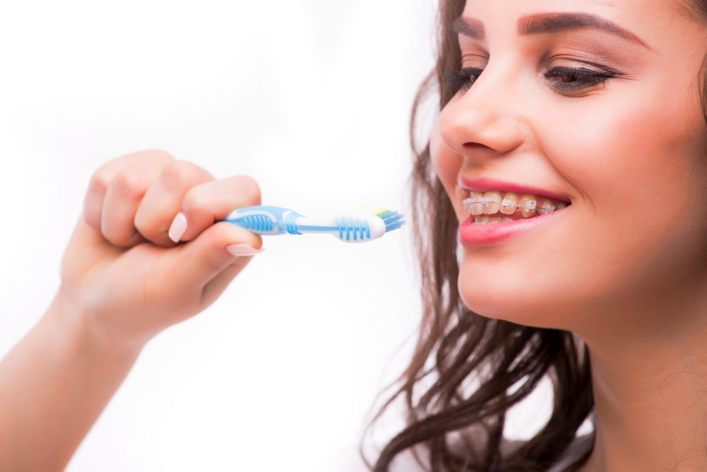 The Proper Way to Brush Teeth with Braces | Dallas Dentist